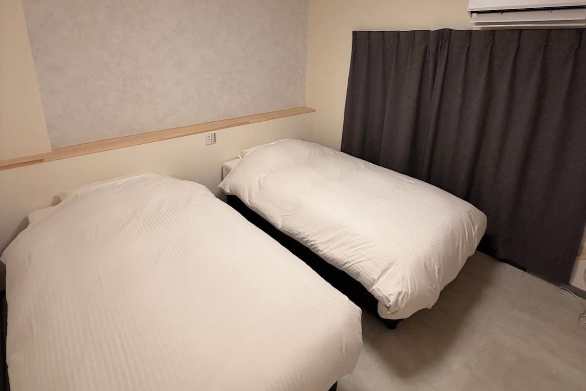 Laptop workspace, free WiFi, bed sheets