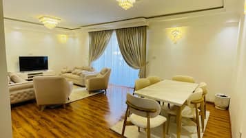 Premium Room, Balcony, City View | Living area