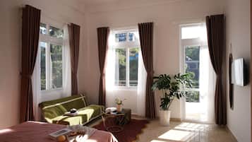 Desk, laptop workspace, blackout curtains, free WiFi