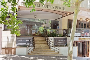 A hotel entrance with a sign reading "ALL SUITES PERTH" and "12 VICTORIA AVENUE". - Victoria Two - A Sepal Stay (Perth)