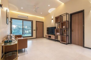 Classic Villa, Garden View | Living area | LED TV - ELIVAAS Energise Soul Retreat (Trimbak)