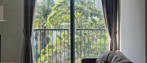 Appartement, 2 chambres, fumeur, vue sur la ville | Aire de séjour