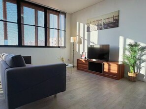 Living area - Spacious 3BR Retreat near CBD | Parking & Balcony (Rosebery)