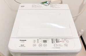 A white Panasonic 5.0 big wave wash machine with control panel and power cord. - XeroB HOUSE FLOLIA501 (Osaka, Naniwa Ward, Nanbanaka)