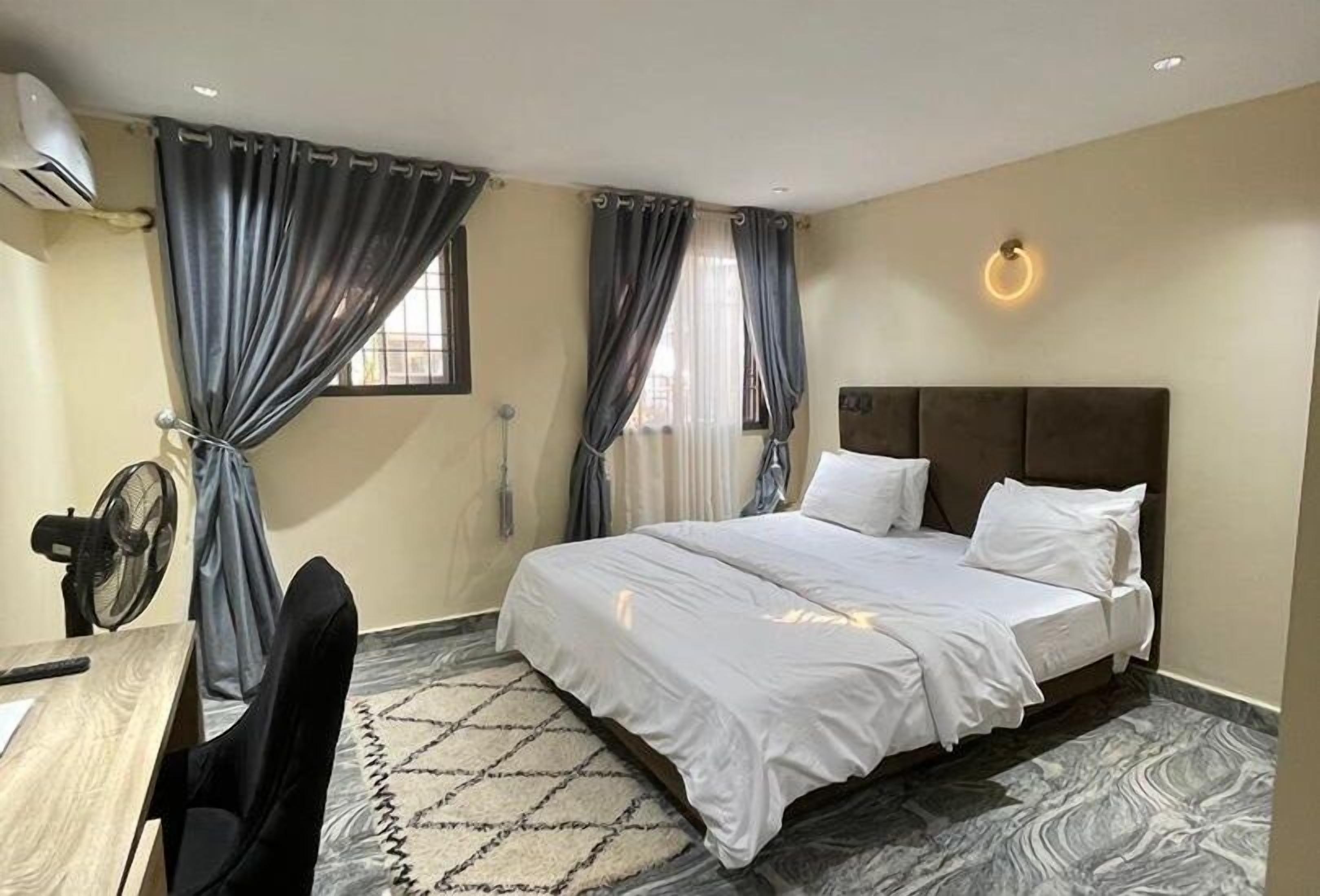 Economy Apartment, Balcony, City View | In-room safe, desk, laptop workspace, blackout drapes