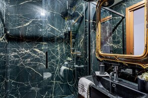 Shower, towels, toilet paper