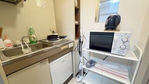 A compact kitchen with a sink, microwave, and a small refrigerator. - XeroB HOUSE FLOLIA203 (Osaka, Naniwa Ward, Nanbanaka)