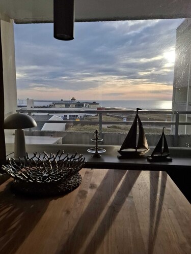 Vacation accommodation WellenSpiel on Borkum with balcony and limited sea view