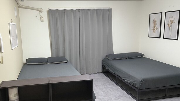 A bedroom with two single beds, a desk, and a chair. - XeroB HOUSE FLOLIA602 (osaka naniwa ward nanbanaka)