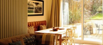 The Cabin is a charming 2-bedroom bungalow in Hayfield, sleeping up to four. Relax in the private hot tub or unwind in the cosy living area after exploring the Peak District.