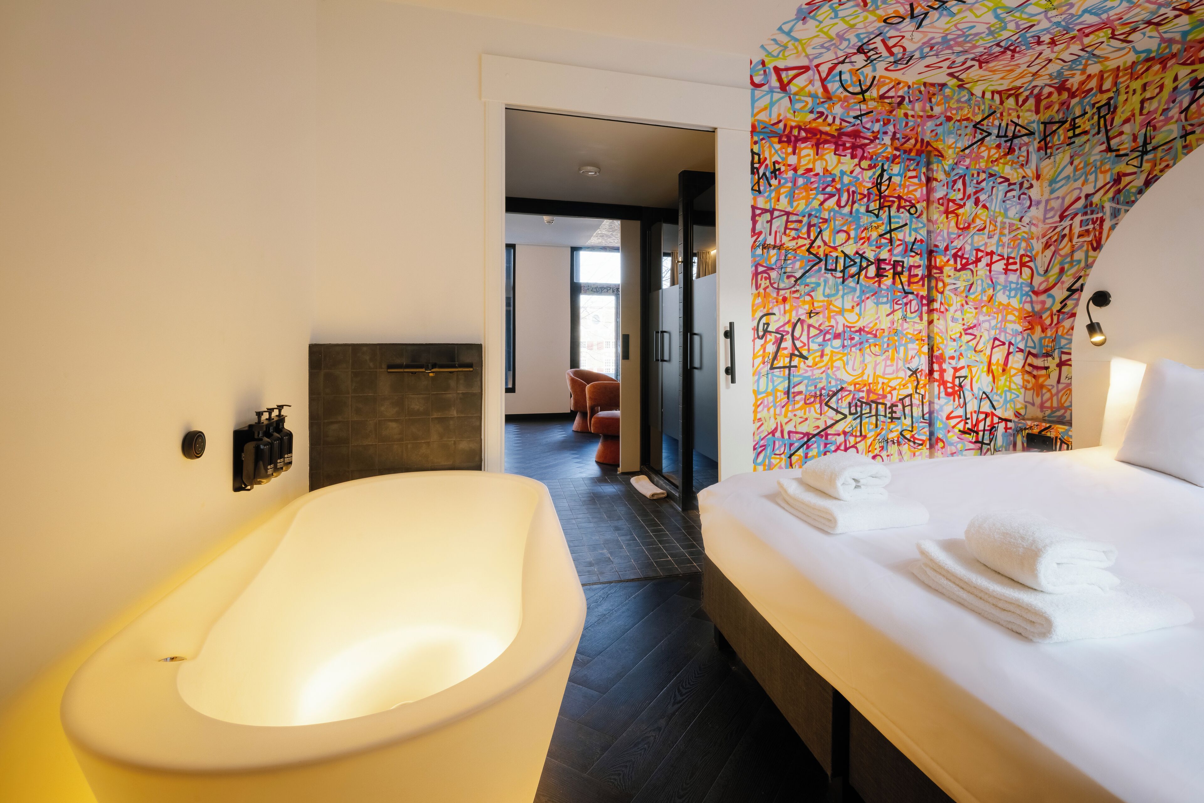 Design Suite, Balcony, City View | Bathroom | Hair dryer, towels, soap, shampoo