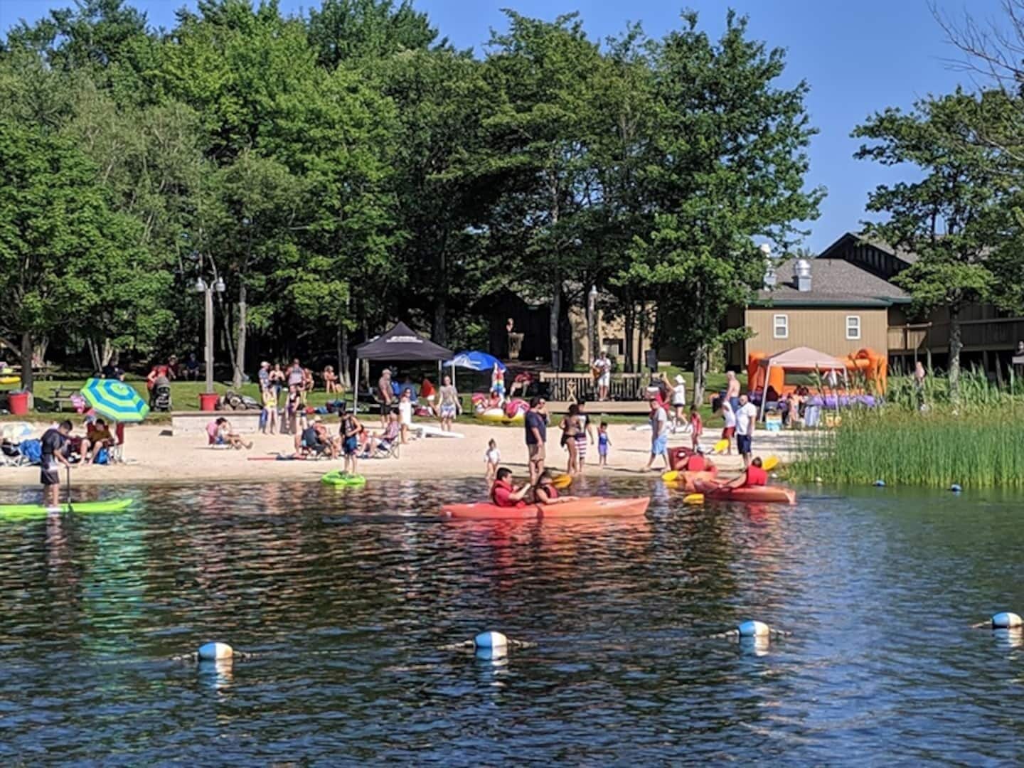 Spend your days splashing in the lake or basking in the sun on the sandy beach, creating unforgettable memories. Glide across the water in a kayak or paddleboard for a refreshing adventure.