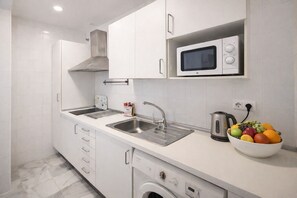 Fridge, microwave, coffee/tea maker, electric kettle