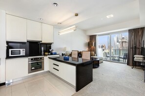 Premium Apartment, 1 Bedroom, Balcony, Canal View | Private kitchen | Espresso maker, electric kettle, toaster, cleaning supplies - Marriott 1BR Apartment with Marina View  (Dubai)