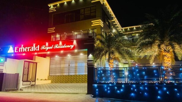 A building with a sign reading 'Emerald Royal Residency.' - Emerald Royal Residency (Aluva)