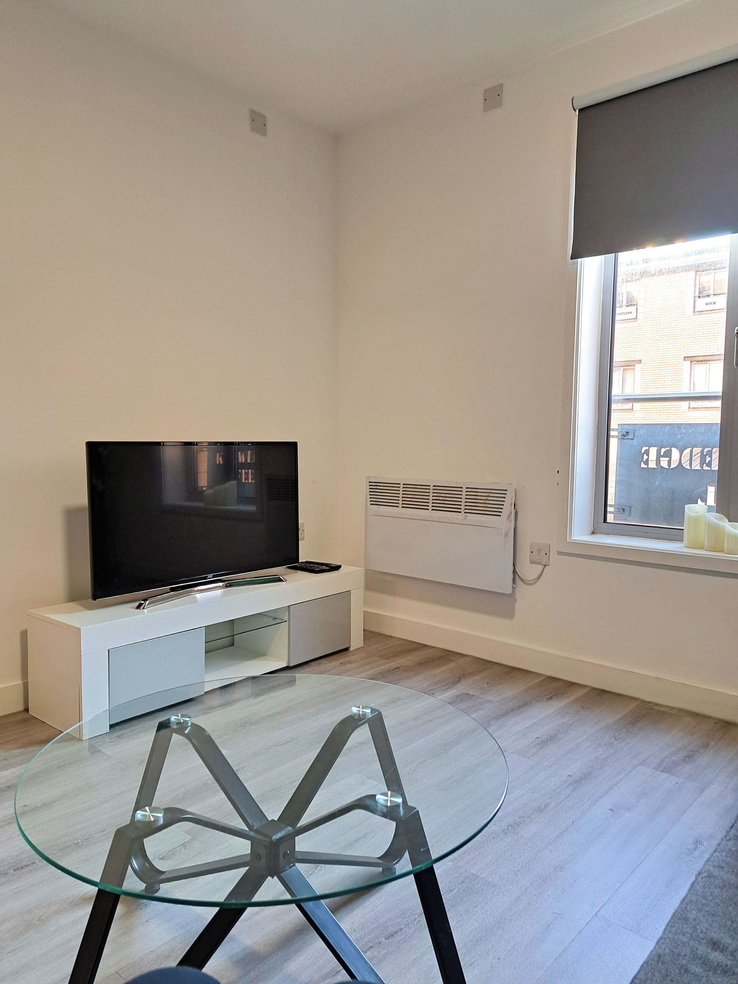 Basic Apartment | Living area | 40-inch LCD TV with satellite channels