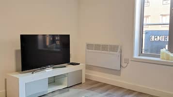 Basic Apartment | Living area | 40-inch LCD TV with satellite channels