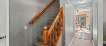 Cozy 4br home with acreage and a river just minutes from Boyne Mountain