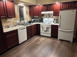 Fridge, microwave, oven, stovetop - Cozy 4br 3 bath home with acreage and a creek just minutes from Boyne Mountain (East Jordan)