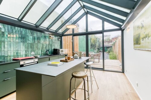 Designer loft 5 minutes from Paris with parking