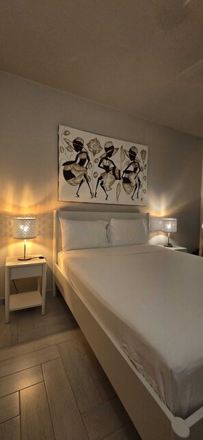 2 habitaciones, tabla de planchar con plancha, wifi y ropa de cama 