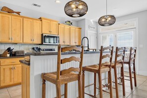 Fridge, microwave, oven, stovetop - Spacious 6BR Retreat | Steps to Beach Access, Elevator, Resort Pool Access (Ocean Isle Beach)
