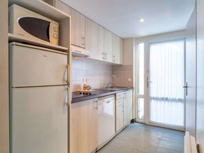 Apartment | Private kitchen - Coastal Apartment With Heated Pool (Guidel)