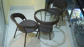 Deluxe-Zimmer | Wohnbereich | Kamin