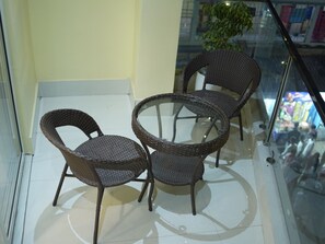 Deluxe-Zimmer | Wohnbereich | Kamin