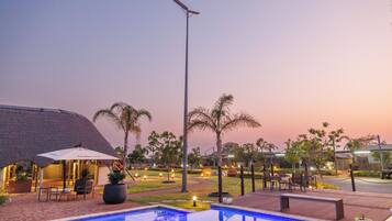 Outdoor pool, open 8:00 AM to 7:00 PM, pool umbrellas, pool loungers