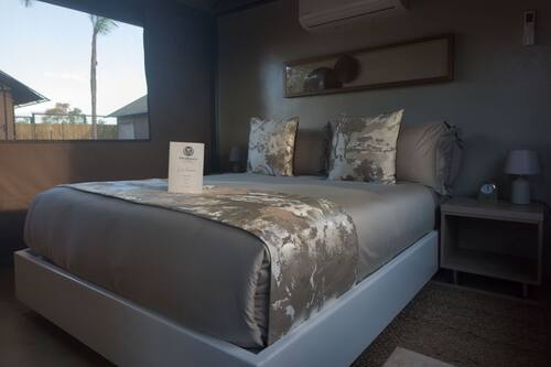 Basic Tent | Premium bedding, down duvets, iron/ironing board, free WiFi