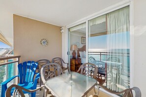 Outdoor dining - Oceanfront condo with private balcony, pool, hot tub & direct beach access (North Myrtle Beach)