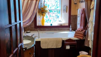 Shower, jetted tub, hair dryer, towels