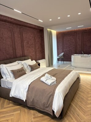 Suite, vista al lago | Caja de seguridad en la habitación, insonorización y wifi gratis 