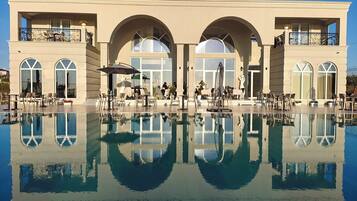Outdoor pool, pool umbrellas, pool loungers