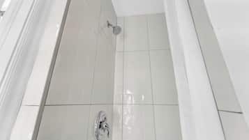 Shower, free toiletries, towels, soap