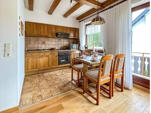 Appartement | Cuisine privée | Chaise haute