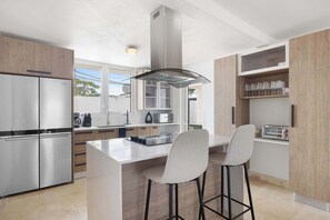Fridge, microwave, stovetop, coffee/tea maker - Cataño Ocean View | Coastal Living Near OSJ Ferry (Cataño)