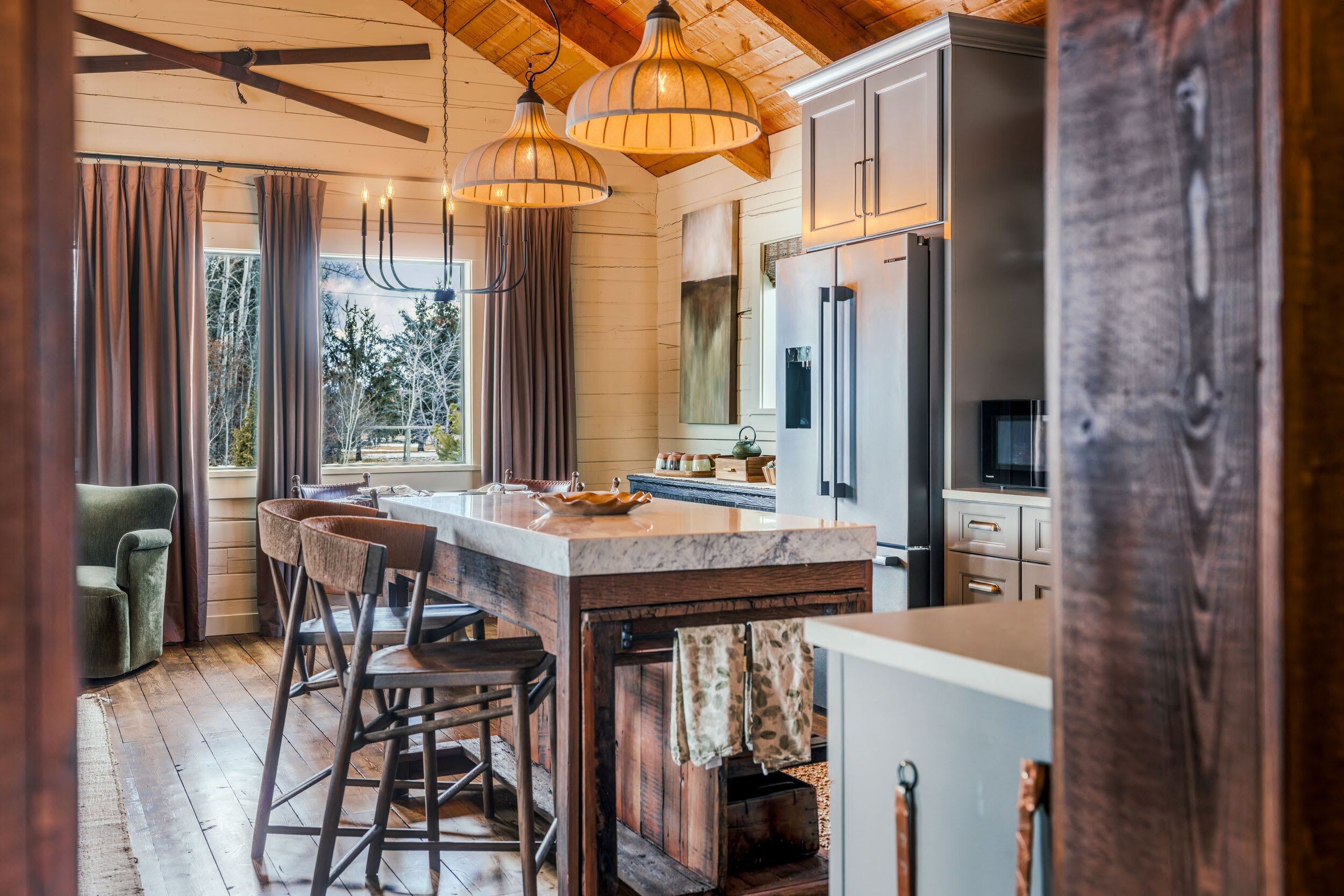 Gather around the island for morning coffee or evening drinks