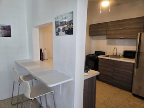 Private kitchen - Cane Sugar Apartment in Lajas (Moca)