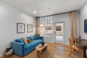 Living area - The Optimist Guesthouse 5 -Downtown loft with gym, sauna, deck overlooking river (Camden)