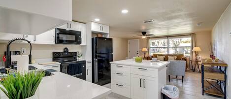 Fridge, microwave, stovetop, coffee/tea maker