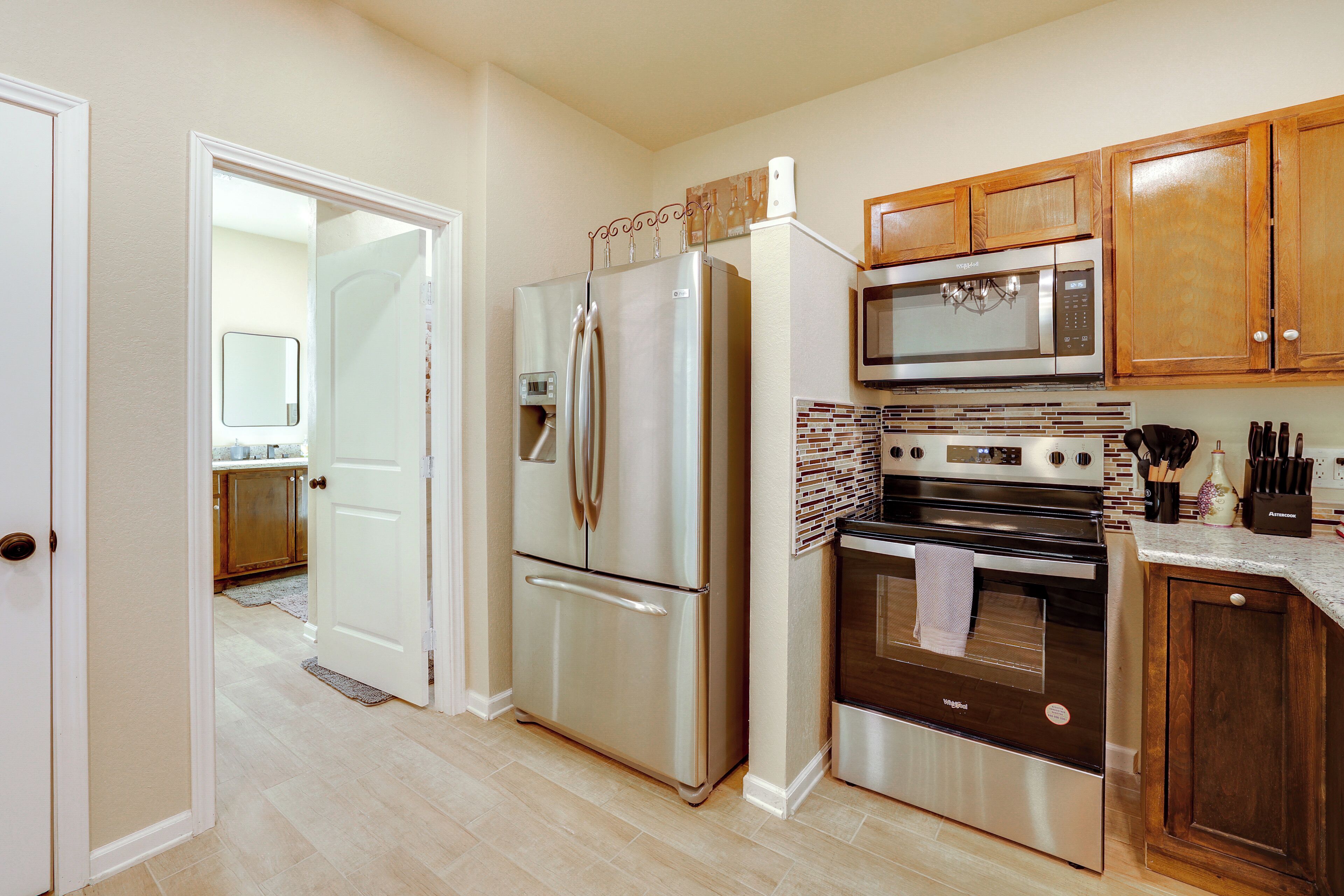 Dishwasher, coffee/tea maker, cookware/dishes/utensils