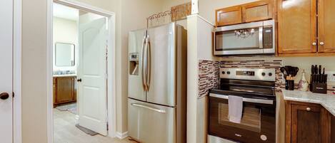 Dishwasher, coffee/tea maker, cookware/dishes/utensils