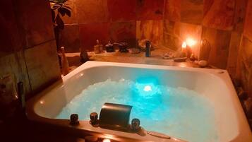 Shower, jetted tub, hair dryer, towels