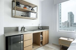 Microwave, stovetop, coffee/tea maker, blender