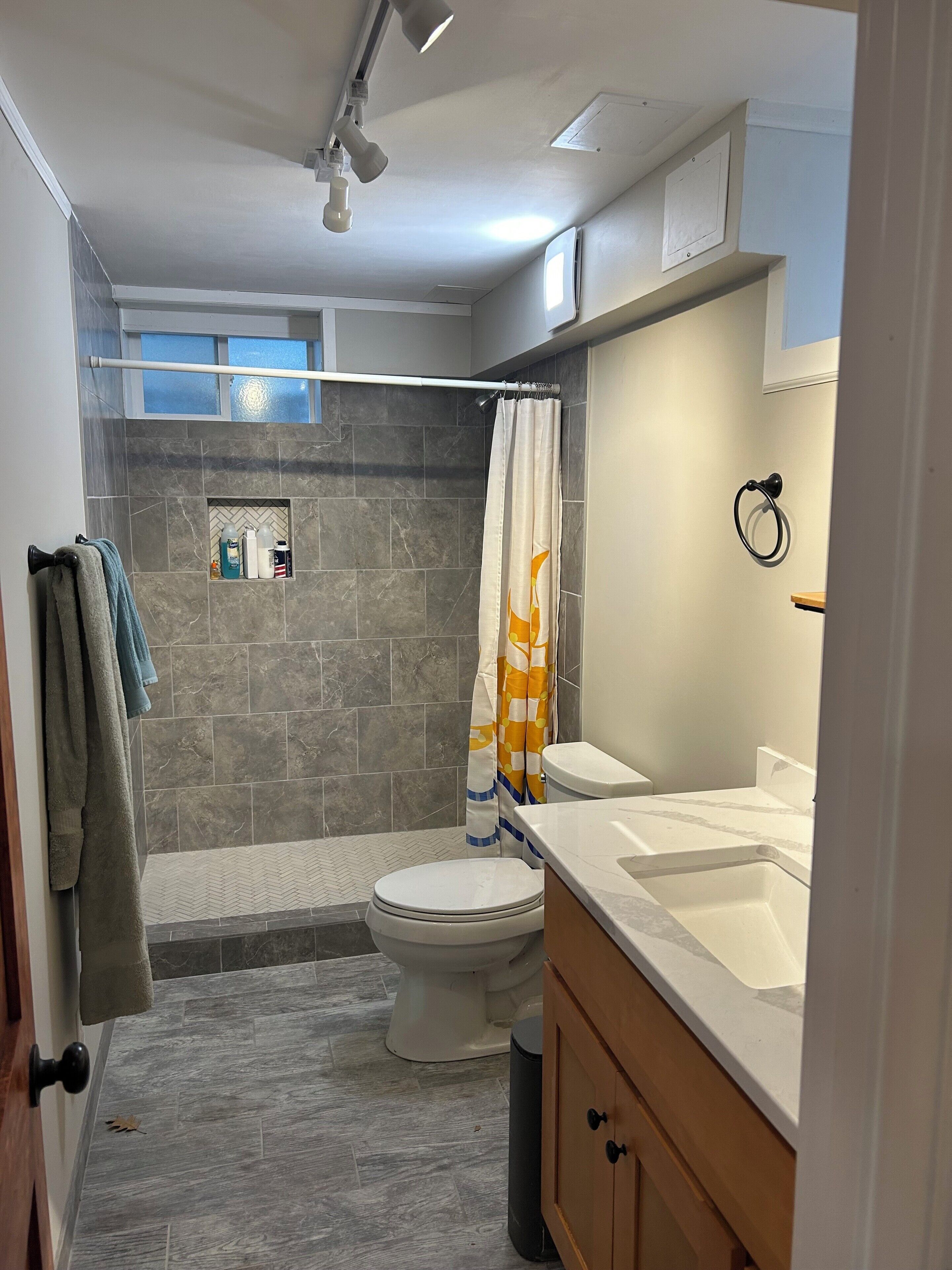 Shower, towels, soap, toilet paper