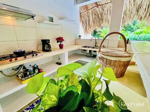 Fridge, coffee/tea maker, toaster, cookware/dishes/utensils