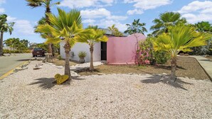 A building with a sign indicating 'POAT HOUSE 15'. - Boat House with air conditioning in the living room and communal pool (Kralendijk)