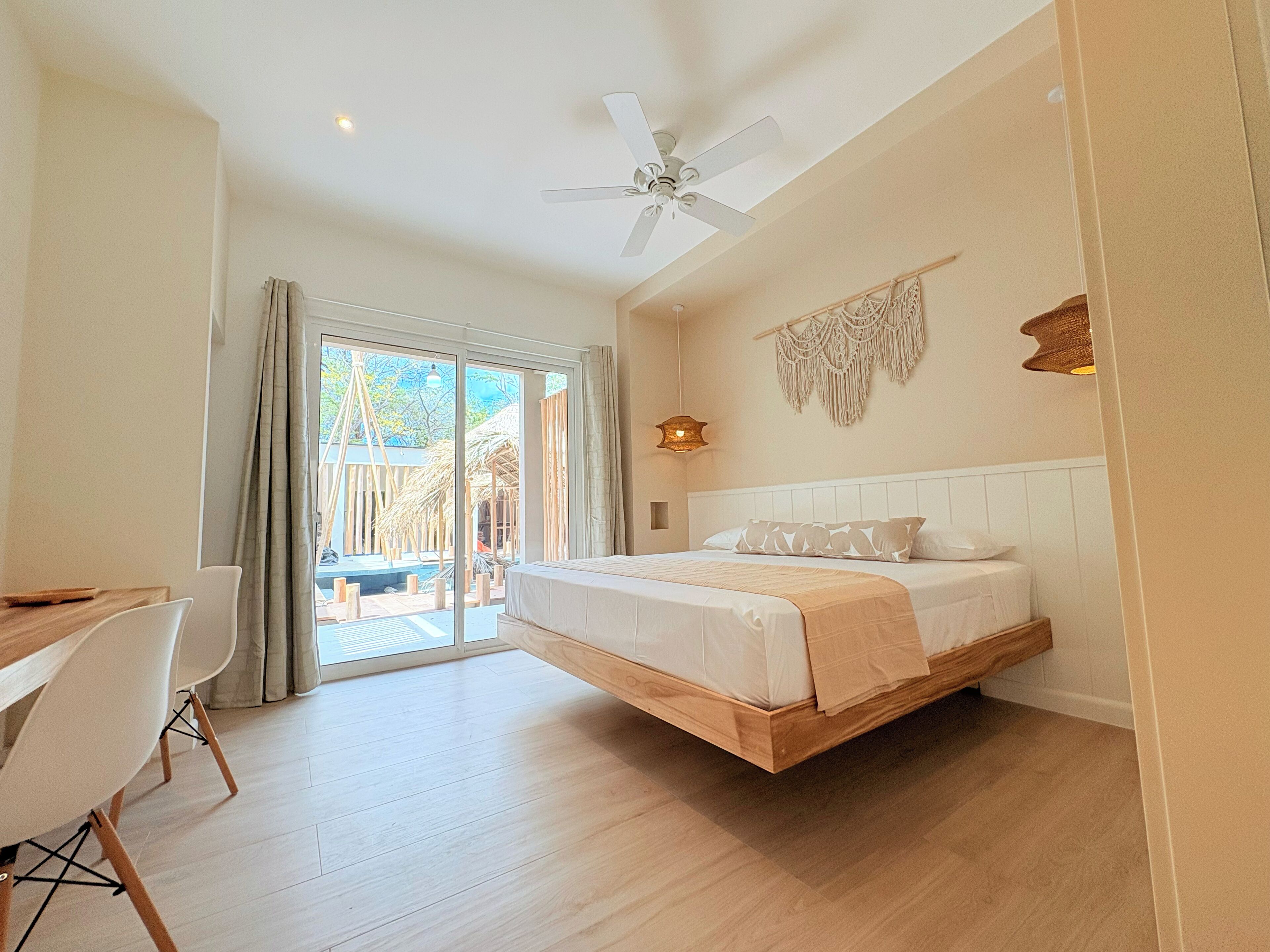 Deluxe Studio, Balcony, Pool View | In-room safe, blackout drapes, soundproofing, iron/ironing board